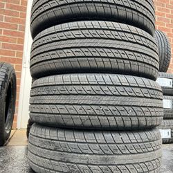 Four 235/55R20 Uniroyal Tiger Paw