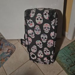 Betsy Johnson roll bag with skulls