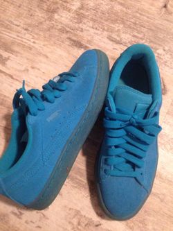 Blue pumas (size 6). Worn twice