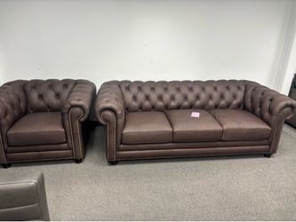 Leather Chesterfield set.  Couch and chair