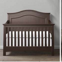 Dark Wood Crib For Infant Or Toddler.