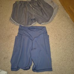 2 Pairs Of Womens Athletic Shorts Nike/ Offline Small