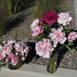 Two Pottery Barn Faux Flower Glass Vases with Pink Flower arrangements