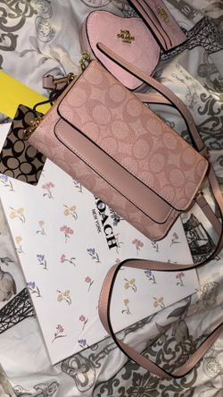 Pink Coach crossbody small clutch bag
