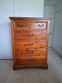 Traditional wood 5-drawer tall pine dresser 56"H x 18"W x 40.5"L
