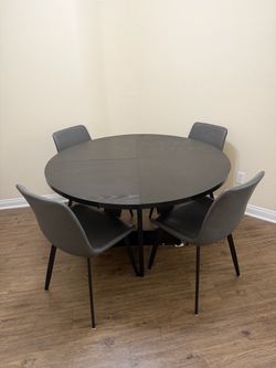47" Round Black Dining Table w/ 4 Grey Chairs