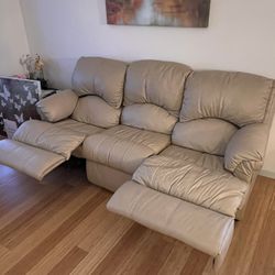 Pending- 2 Reclining Leather Couches 