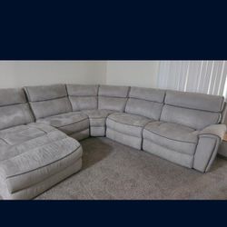 Light Grey Reclining Sectional With Chase And Outlets
