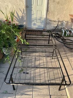 Twin  size  metal  bed  frame  (foldable)  -  $30