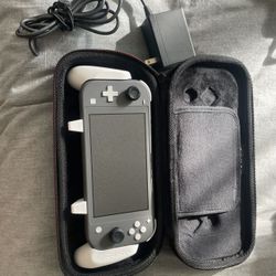 Nintendo Switch Lite + Games And Extras 