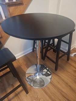 Round Bistro Table and Four Bar Stools