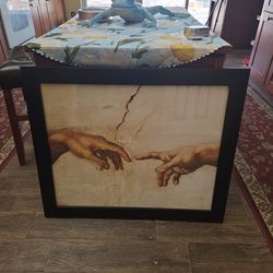 Michelangelo's creation of man framed print