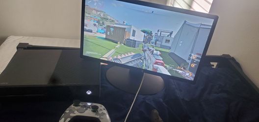 Xbox One Console with Camo Controller and monitor