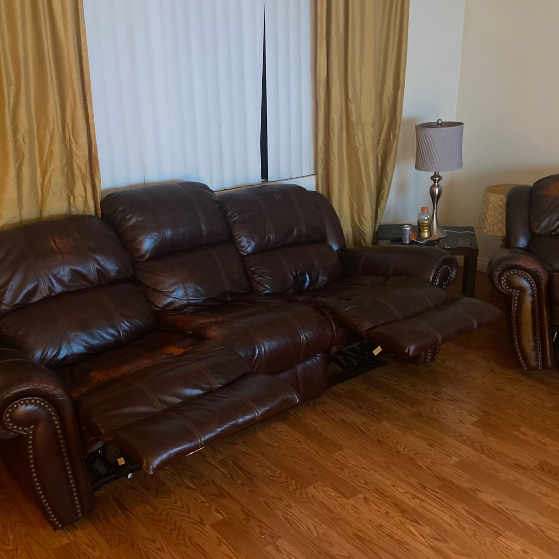 Gently Used Sofa And Recliner