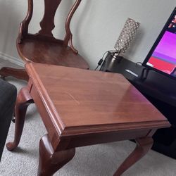 Antique swivel chair in perfect condition $60 Wooden table $30