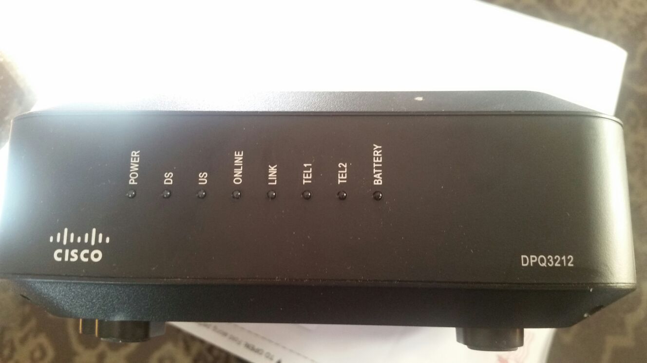 Cox Cisco phone service modem with connection for computer.