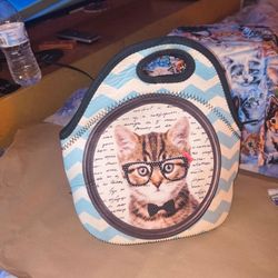 neoprene lunch tote with cat wearing glasses and a bowtie
