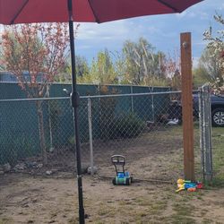 TWO PATIO UMBRELLAS.