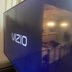 70 Inch Vizio TV  With Glass Stand 