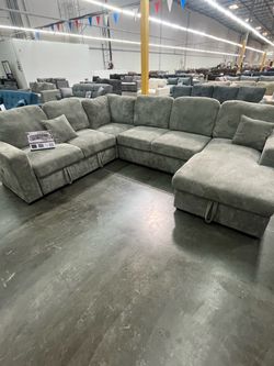 SECTIONAL SOFA WITH PULL OUT AND STORAGE
