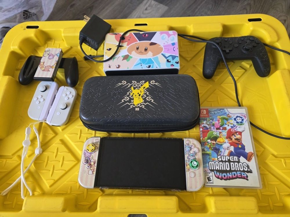 Nintendo Switch OLED Console & Super Mario Bros Wonders Game & Acessories