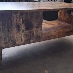 Wooden Coffee Table / TV Stand
Used but in great condition. This versatile piece can be used as a coffee table or a TV stand