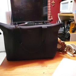 AUTHENTIC ALMOST NEW DAGNE DOVER NEOPRENE XL CARRY-ALL BAG. ZIPPERED DUST BAG AND POUCH INCLUDED.