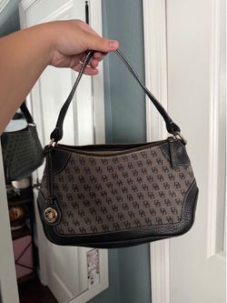 Dooney & Bourke black and grey matching purse and wallet set