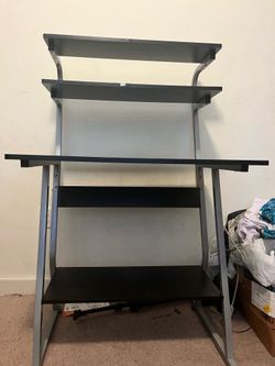 Black multitier computer desk with metal frame
