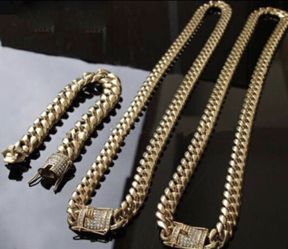 New 18 k yellow gold Cuban link chain and bracelet