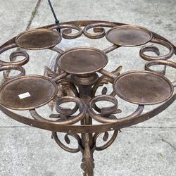 Antique Decorative wrought iron floor candle stand. 4 Foot High 20 Inch W