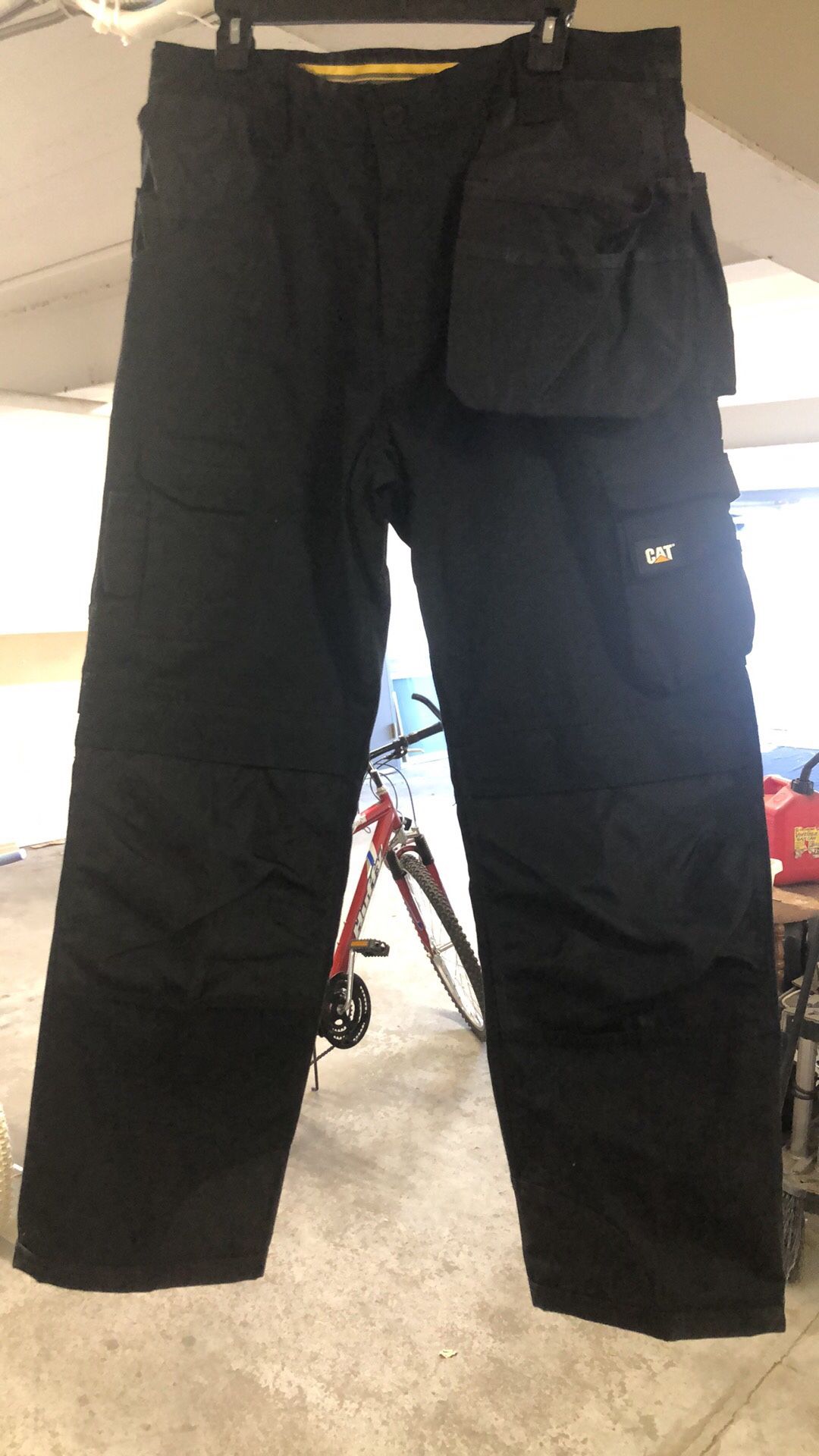 36x32 New CAT Pants $60 each