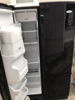 Refrigerator for $240 text me if interested