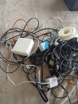 Bundle of phone chargers, wall banks ,earbuds,