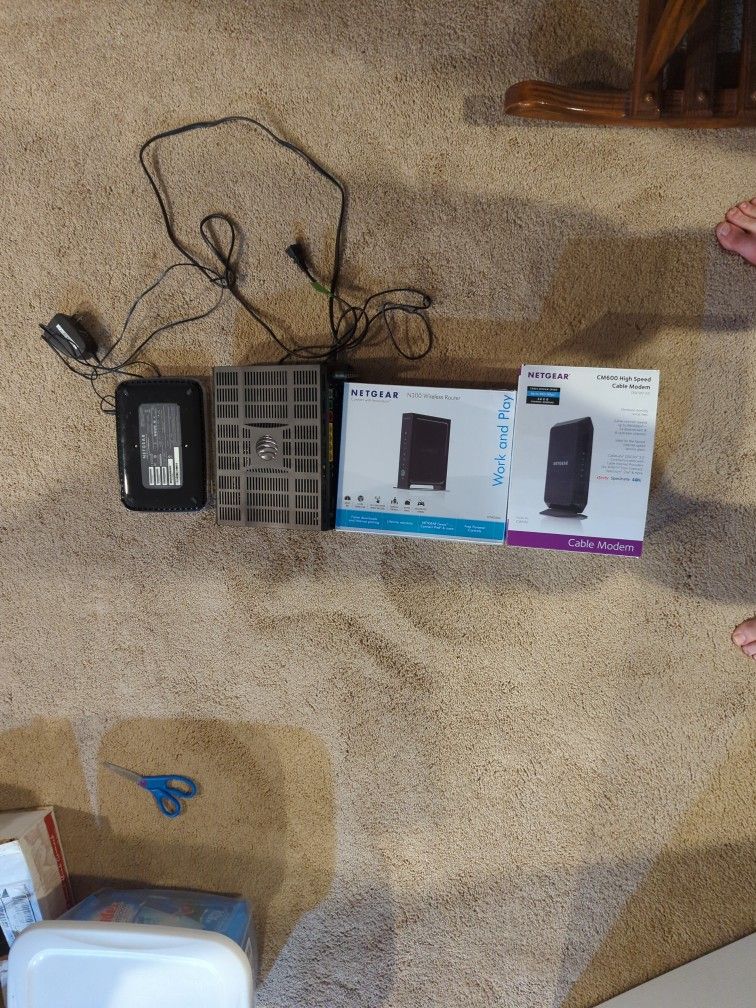 Lot of 2 Wireless Routers and 2 High Speed Modems