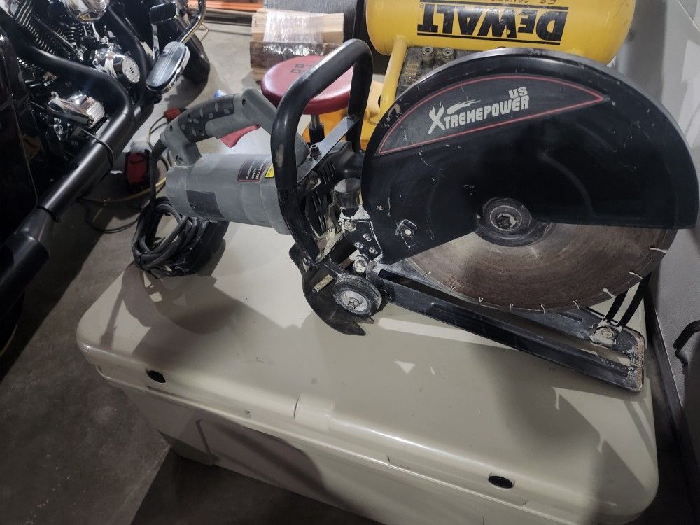 Electric concrete saw 12 inch diamond blade.\nWater with g f I