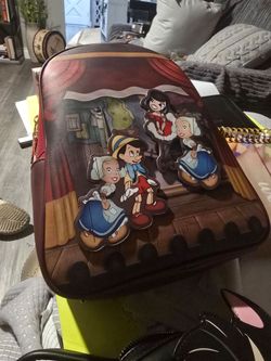 Disney loungefly pinocchio backpack