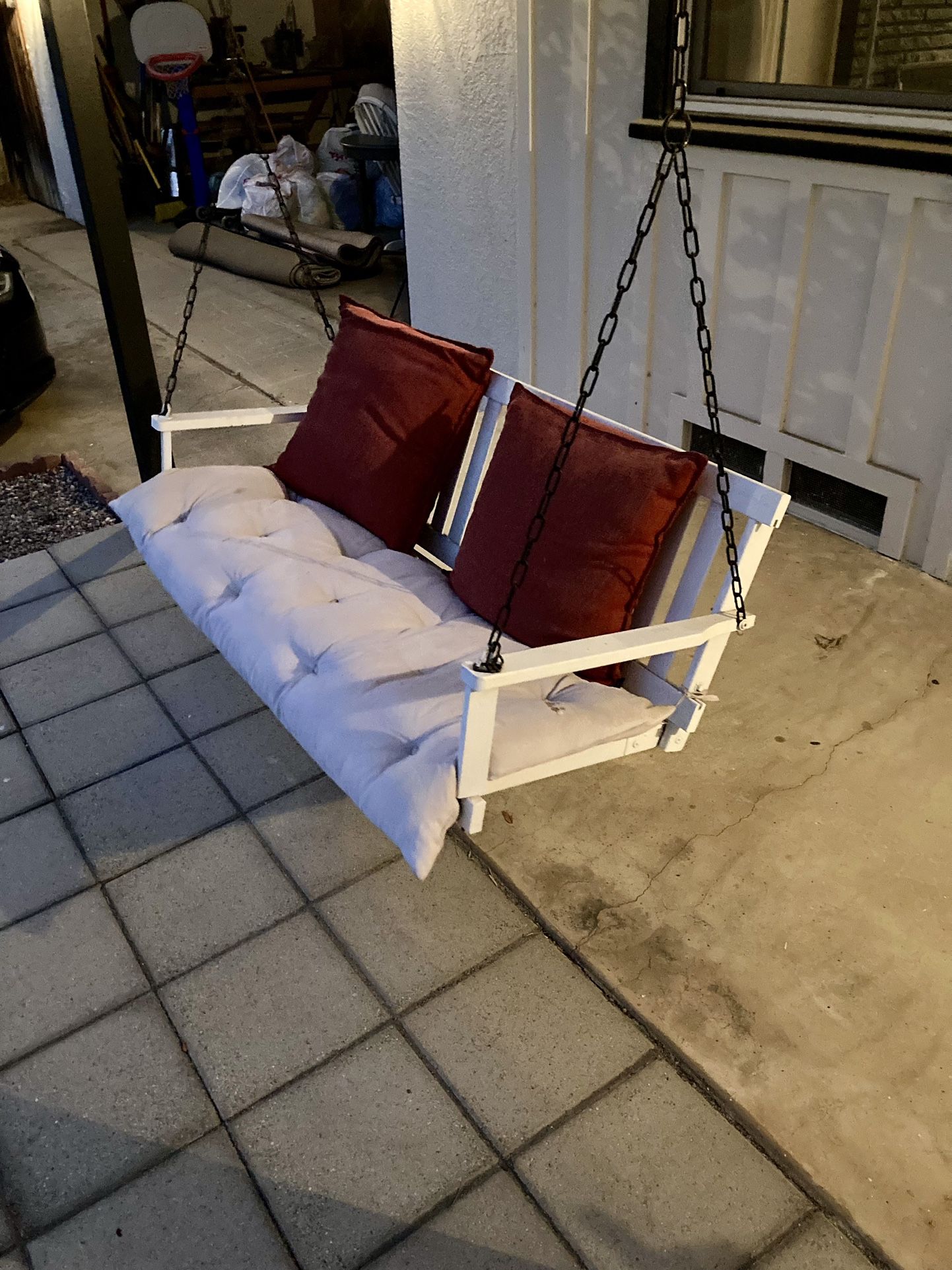 Porch Swing And Adirondack Chairs