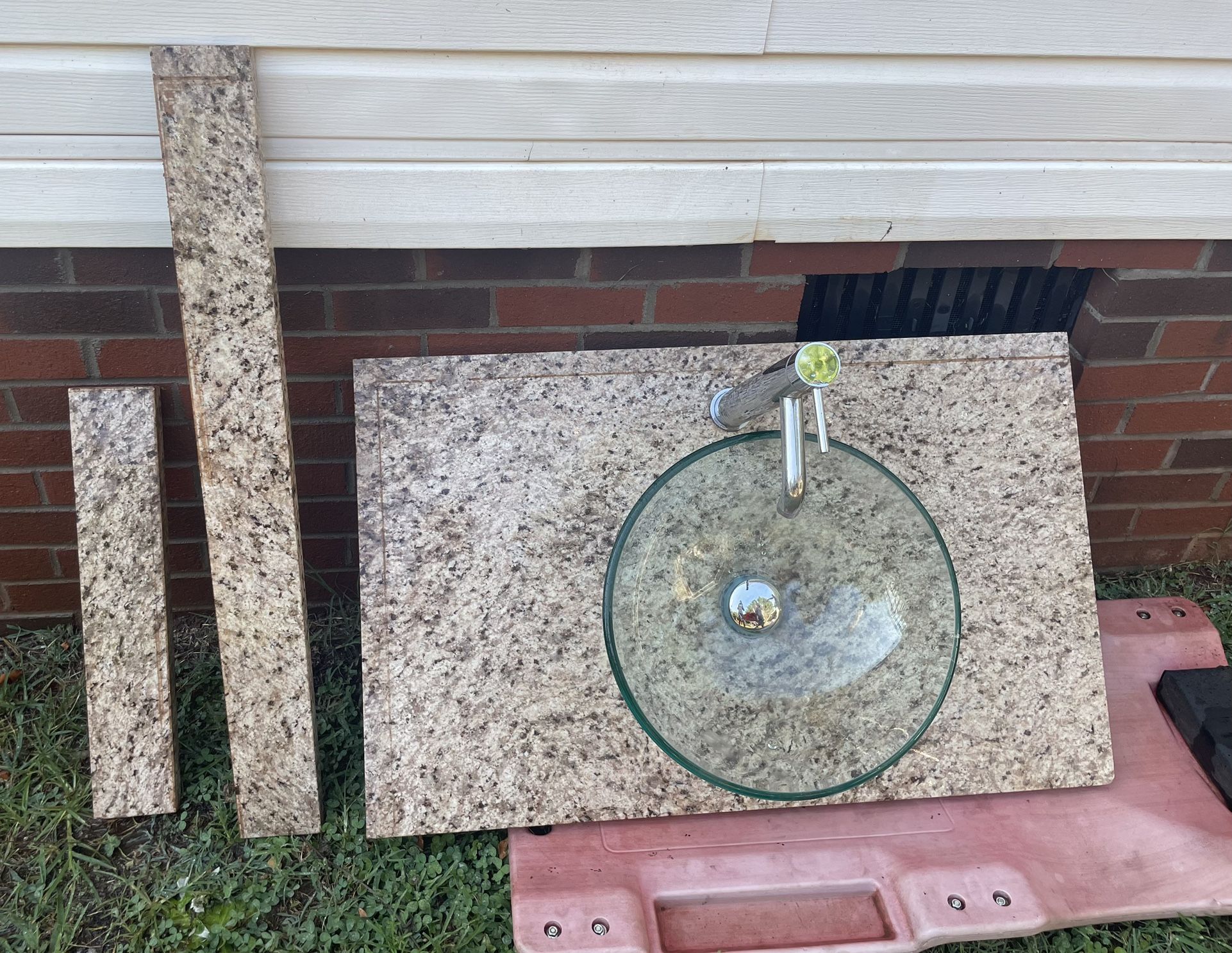 Bathroom countertop sink with faucet