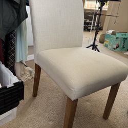 Beige Chair With Brown Legs