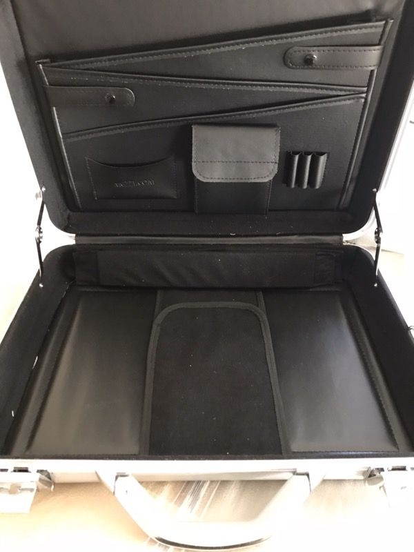 Mezzo caliber series briefcase with original strap.