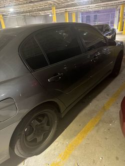 Dark Gray Malibu 06’