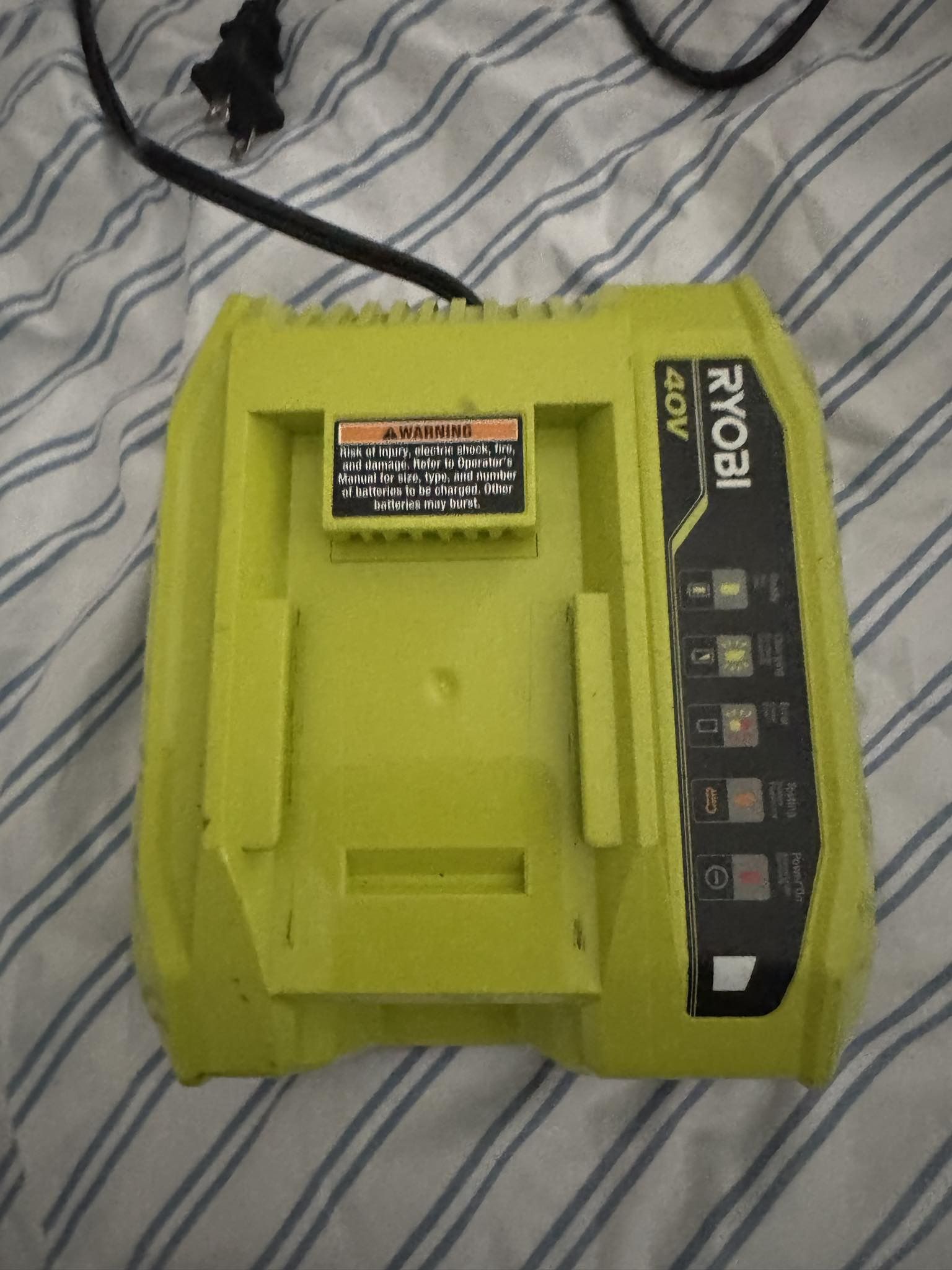 Two Ryobi Batteries And Charger