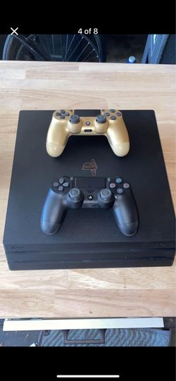 PS4 Console 2 controllers and 3 games