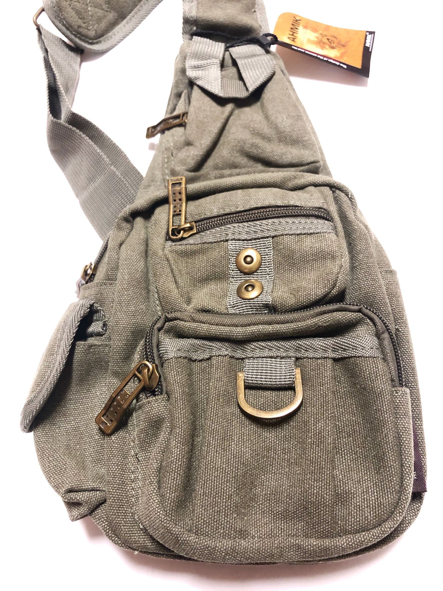 Coach West Pack Sling Backpack in Signature Canvas with Varsity Stripe for  Sale in Banning, CA - OfferUp