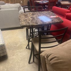 Brand new 36 inch high table and two stools for 399