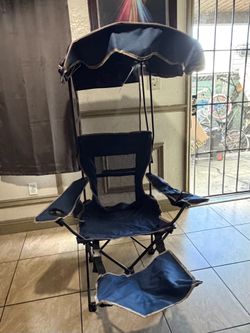 Folding canopy camping chair with footrest