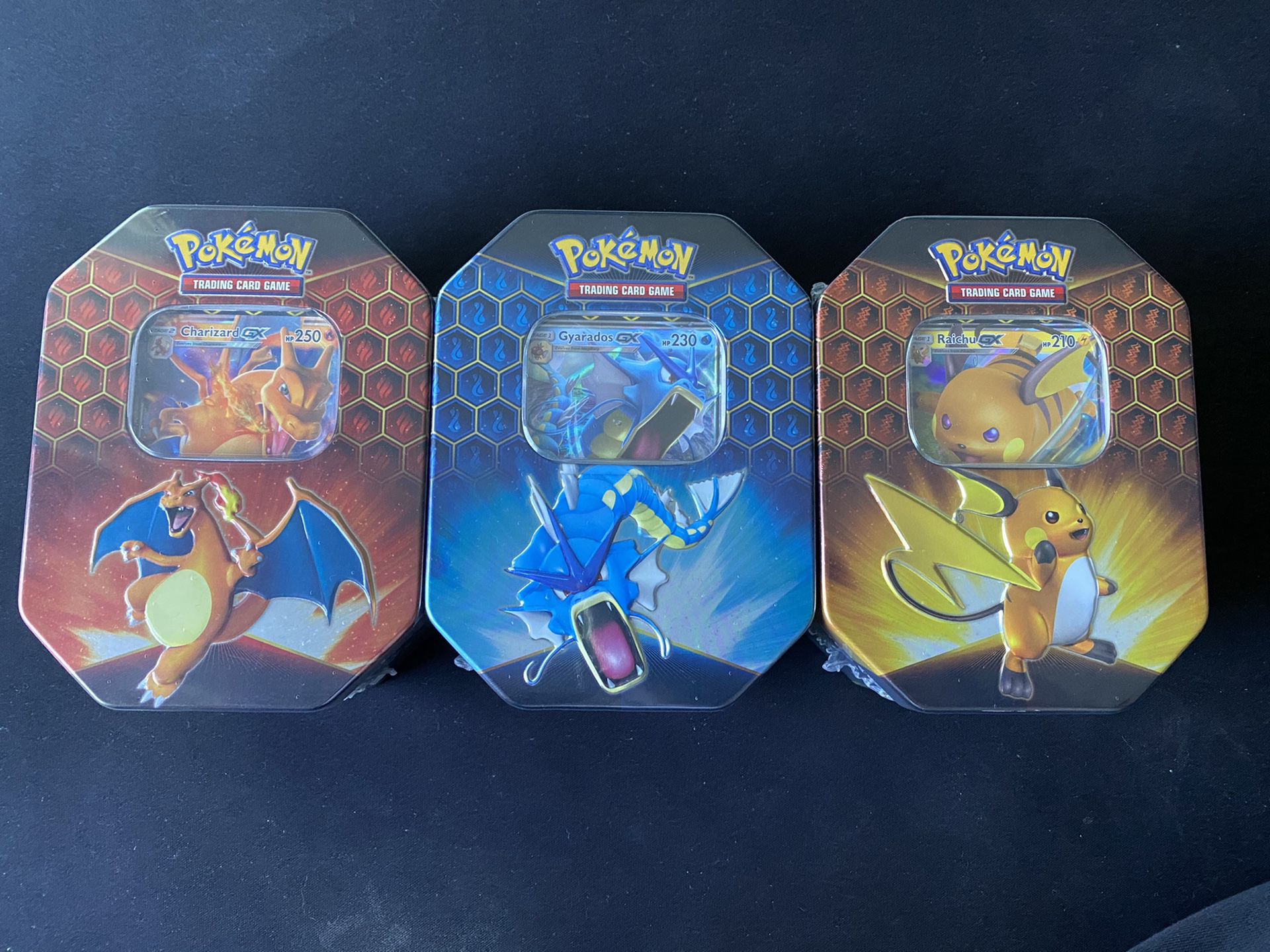 Pokemon TCG Hidden Fates Tin Set of 3 - Charizard Gyarados Raichu