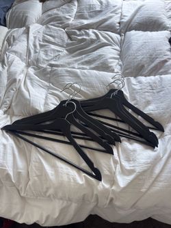 8 wooden hangars