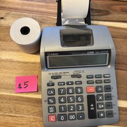 Casio calculator with printer paper 